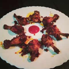 A picture of Chicken lollipops.
