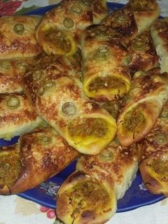 صورة لوصفة بيتزا على شكل بليغات