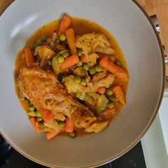 A picture of Vegetable stew with chicken.