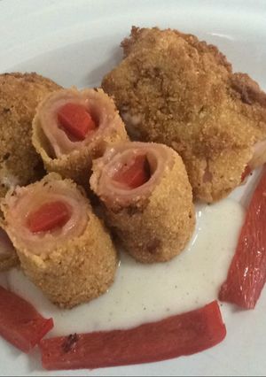 Una foto de Rollitos de mozzarella, jamón y morrones