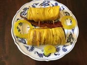 A picture of aubergine rolls