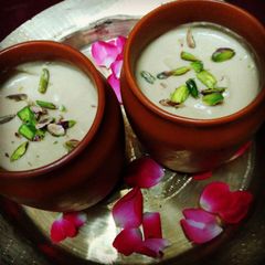 A picture of Nolen Gurer Mishti Doi(Yoghurt with Date palm jaggery) Bengali cuisine.