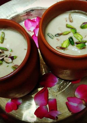 A picture of Nolen Gurer Mishti Doi(Yoghurt with Date palm jaggery) Bengali cuisine.