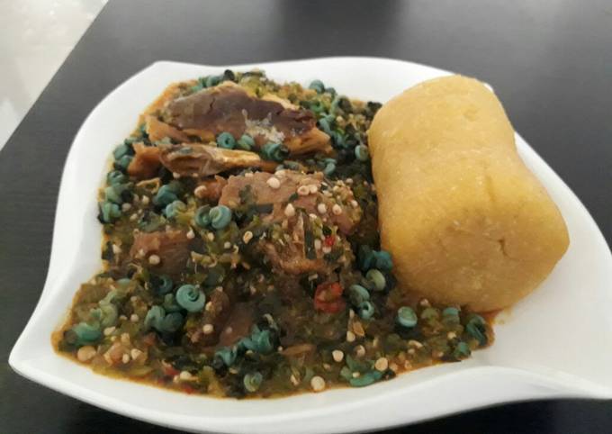 Okro soup with periwrinkle and garri