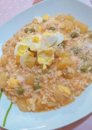 Foto di Riso patate,piselli e uovo