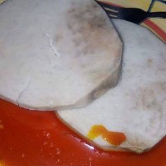 A picture of Boiled yam with palmoil.