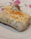 Merluza al horno con salsa bechamel