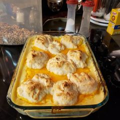 A picture of Creamy Chicken and biscuits.
