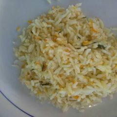 A picture of Carrot rice with egg.
