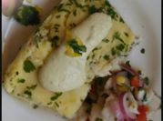 Una foto de corvina a la mantequilla