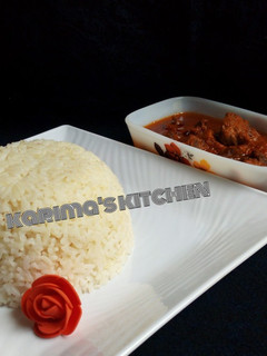 A picture of White rice and stew.