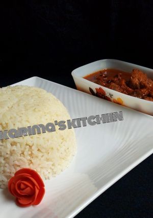 A picture of White rice and stew.