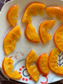 Una foto de Naranjas confitadas