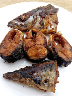 A picture of Fried Fish, with breaking apart.