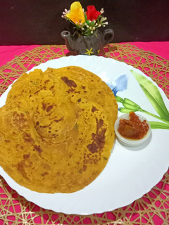 A picture of Egg Lachcha Masala Paratha With Whole Wheat Flour.