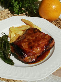 Una foto de Costillas asadas con naranja