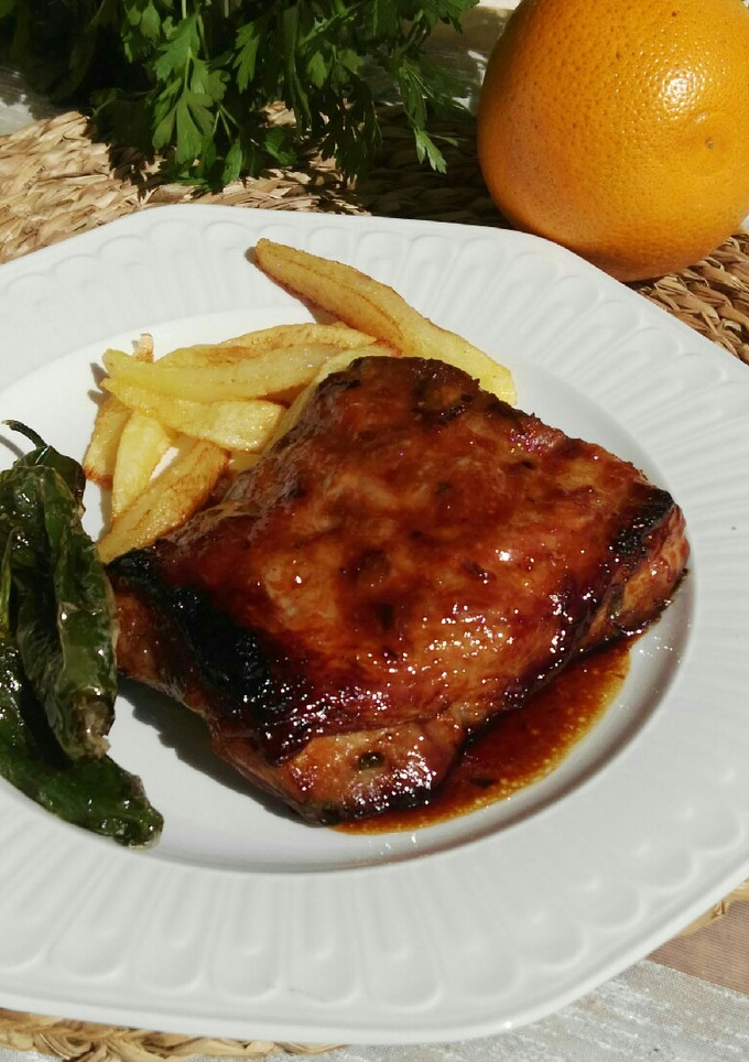 Una foto de Costillas asadas con naranja
