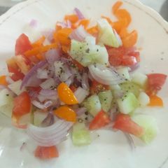 A picture of Simple tomato cucumber salad.