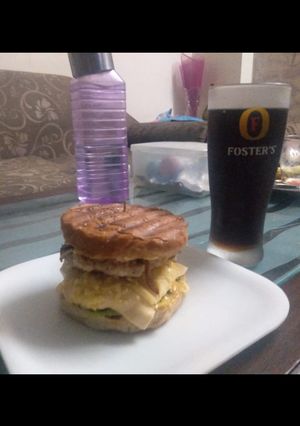 A picture of Homemade tikki chicken burgers.