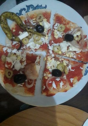 صورة لوصفة بيتزا في الطاجين
