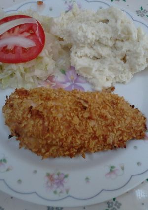 Una foto de Corn Pollo (Empanizado con hojuelas)