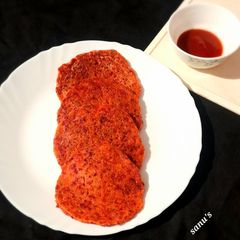 A picture of Beetroot Rava Uttapam.