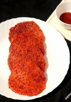 A picture of Beetroot Rava Uttapam.