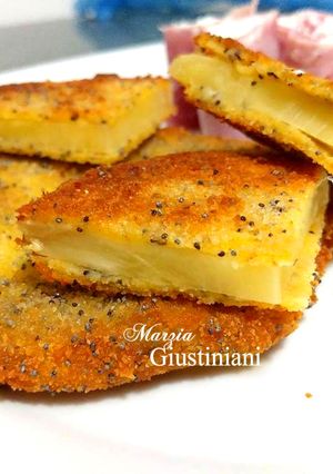 Foto di Ananas impanata e fritta