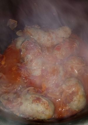 Una foto de Chorizos a la pomarola