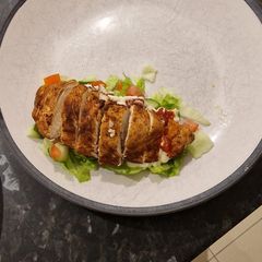 A picture of Chipotle Chicken with Chilli Jam salad bed.