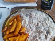 Una foto de filete strogonoff
