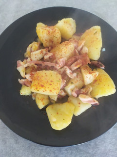 Una foto de Pulpo con cachelos "A feira"