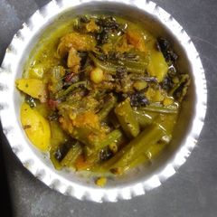 Malabar spinach with mustard paste A picture of Malabar spinach with mustard paste.