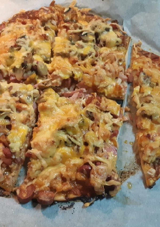 Una foto de Pizza casera con masa fresca