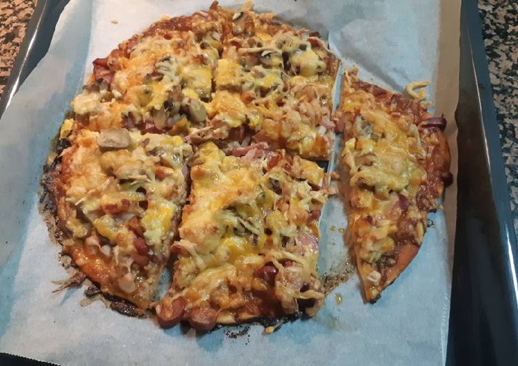 Pizza casera con masa fresca