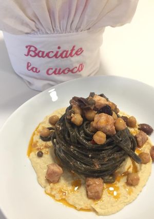 A picture of Squid Ink Tagliolini with Swordfish and Chickpeas.
