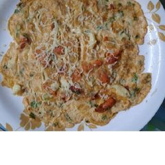 A picture of Grilled chicken cheese omelette.
