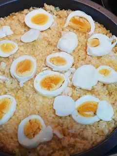 Una foto de Arroz con pollo y queso