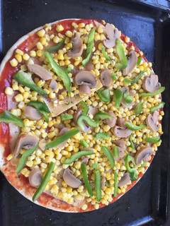 Una foto de Pizza vegetariana