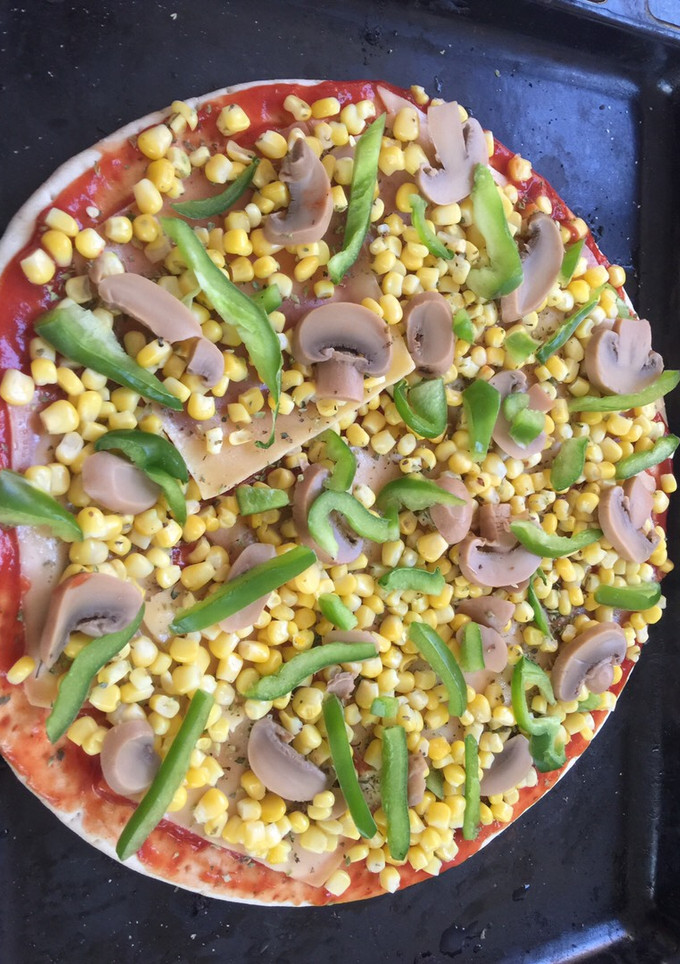 Una foto de Pizza vegetariana