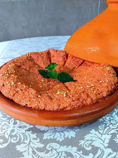 Una foto de Mohammara de pimientos asados con nueces y sésamo