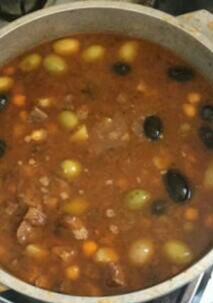Una foto de Bacalao con olivas