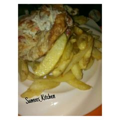 A picture of Chips and fried Egg.