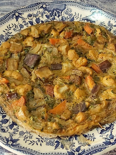 Una foto de Tortilla de coliflor y berenjena
