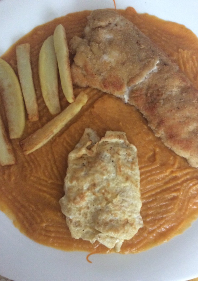 Una foto de Merluza con puré de boniato