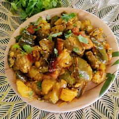A picture of Potato, Brinjal Dry Curry With Mixed Mustard Powder.
