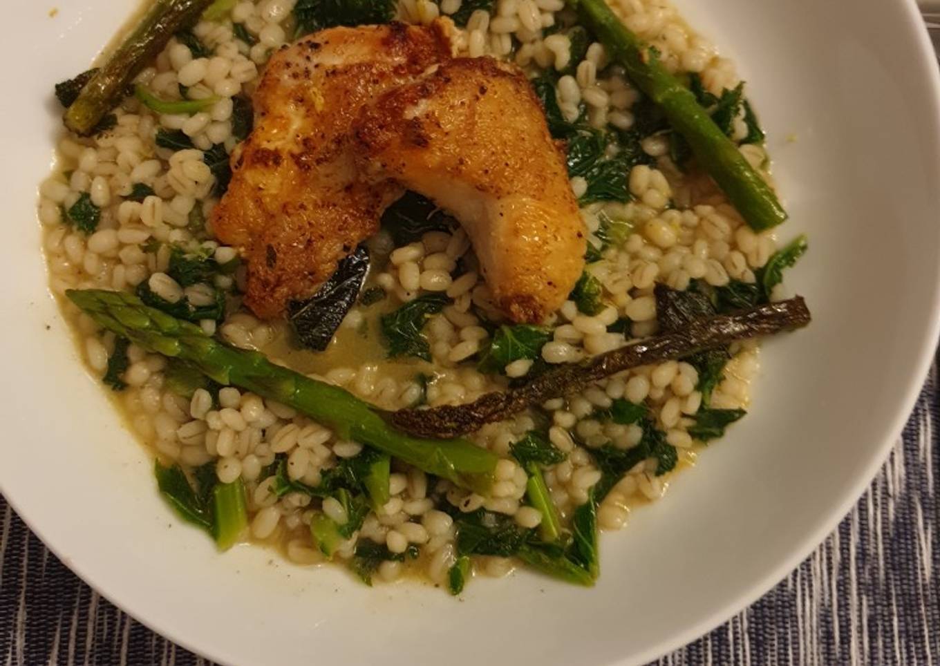 Poussin pearl barley risotto with kale