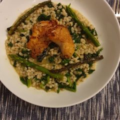 A picture of Poussin pearl barley risotto with kale.