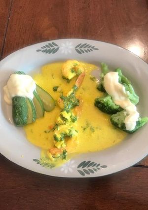 Una foto de Camarones con perejil y azafrán