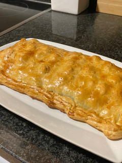 Una foto de Empanada de espinacas, bacon y queso feta